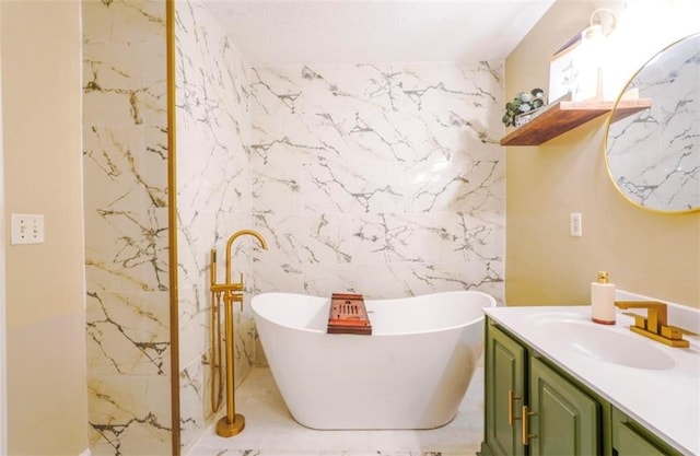 bathroom with vanity, tile walls, and a bathing tub