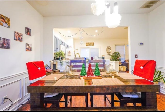 dining area with dark wood-type flooring