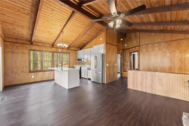 unfurnished living room with wooden ceiling, ceiling fan, wooden walls, wood finished floors, and a fireplace