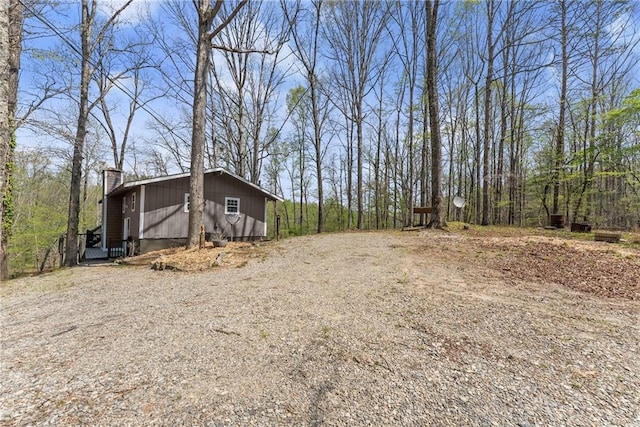 view of side of property with central AC unit