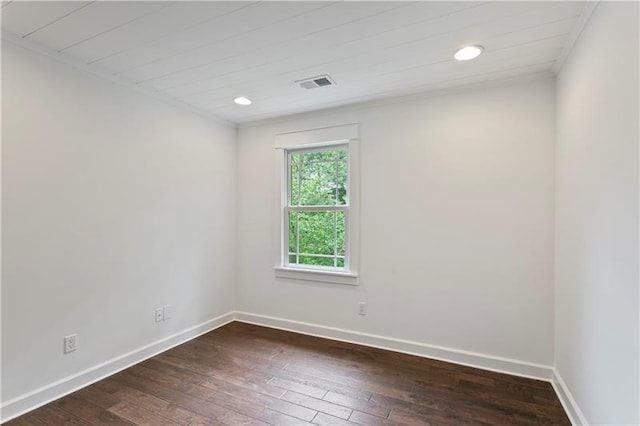 empty room with dark wood-type flooring