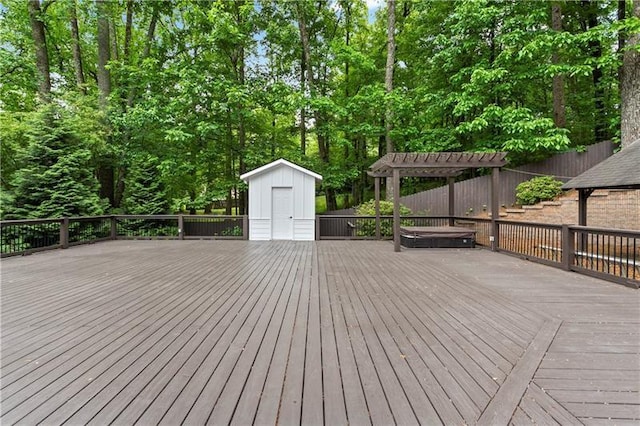 deck featuring a shed and a pergola