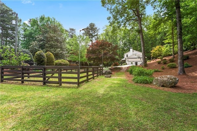 view of yard featuring a garage