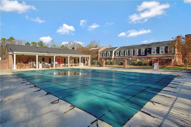 view of swimming pool with a patio