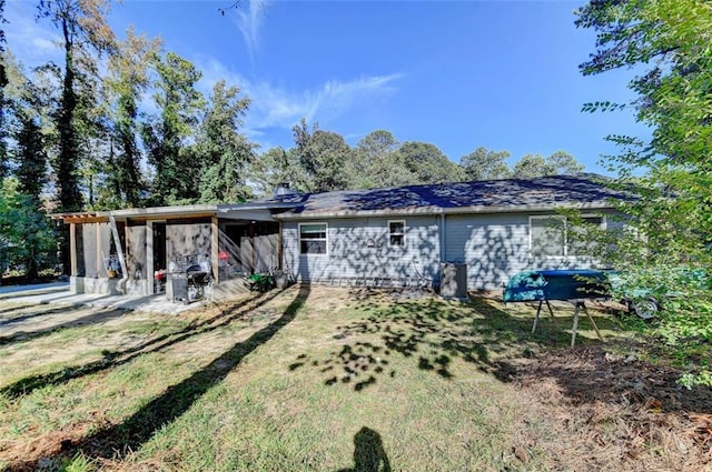 back of house featuring a patio area