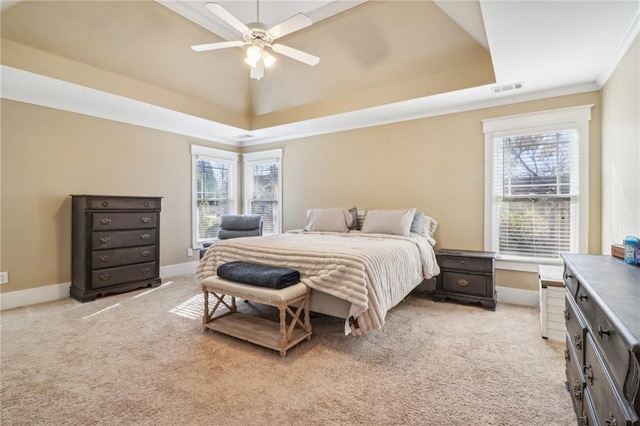 bedroom featuring light colored carpet, multiple windows, crown molding, and ceiling fan