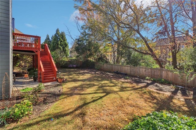 view of yard with a deck