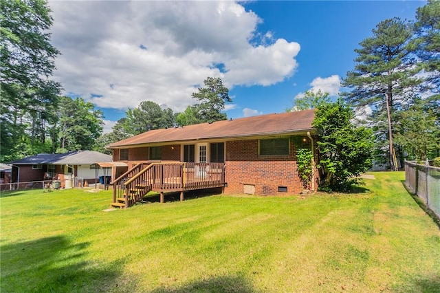 2311 Cherry Blossom Dr SW, Atlanta, GA 30331 - rear view of house featuring a wooden deck, crawl space, and brick siding