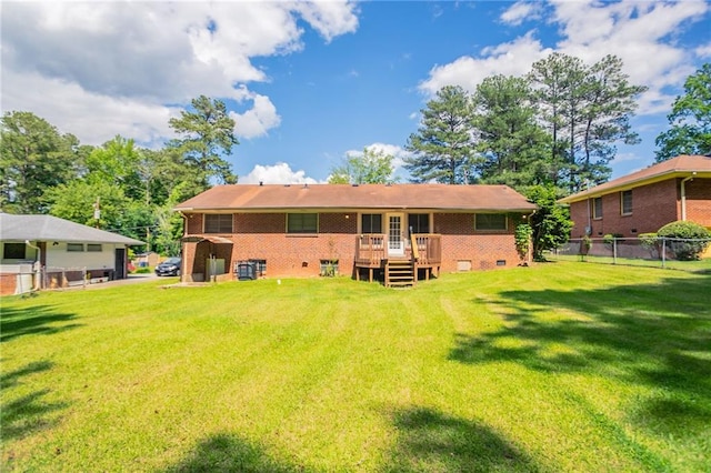 2311 Cherry Blossom Dr SW, Atlanta, GA 30331 - rear view of property with brick siding and a deck