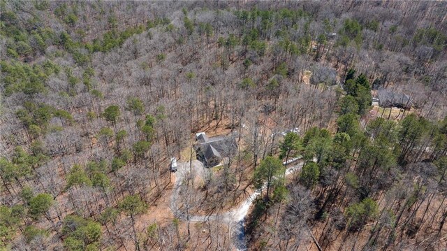 aerial view featuring a view of trees