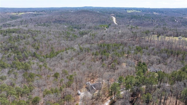 bird's eye view featuring a forest view