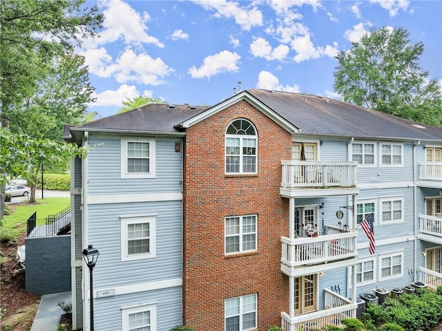 rear view of house with a balcony