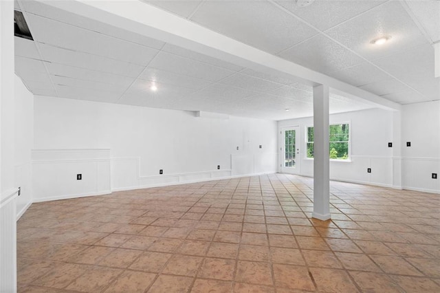 1661 Duxbury Ln NW, Kennesaw, GA 30152 - empty room featuring a drop ceiling and baseboards