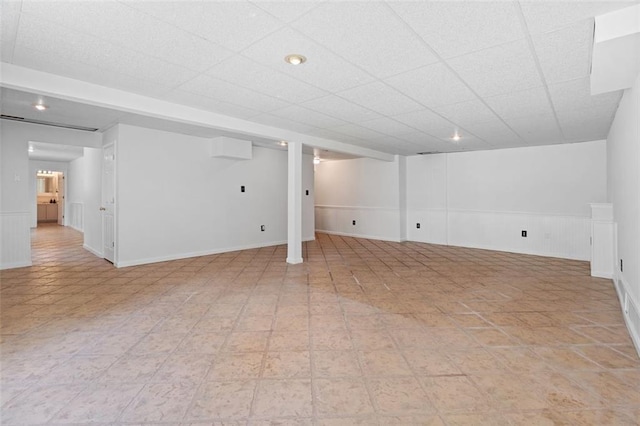 1661 Duxbury Ln NW, Kennesaw, GA 30152 - finished basement with a wainscoted wall and light tile patterned floors