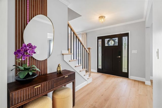 1661 Duxbury Ln NW, Kennesaw, GA 30152 - entryway with wood finished floors, baseboards, stairway, and ornamental molding