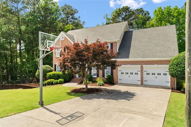 1661 Duxbury Ln NW, Kennesaw, GA 30152 - view of front of property featuring brick siding, concrete driveway, an attached garage, a front yard, and roof with shingles