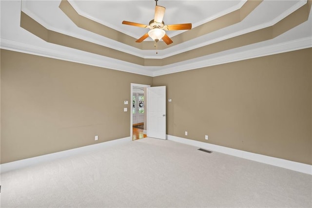 4842 Registry Dr NW, Kennesaw, GA 30152 - carpeted spare room with crown molding, a raised ceiling, ceiling fan, and baseboards