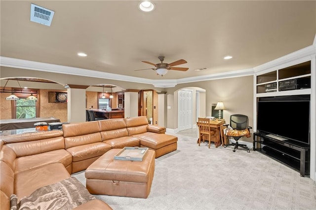 4842 Registry Dr NW, Kennesaw, GA 30152 - living area with arched walkways, ornate columns, a ceiling fan, crown molding, and carpet flooring