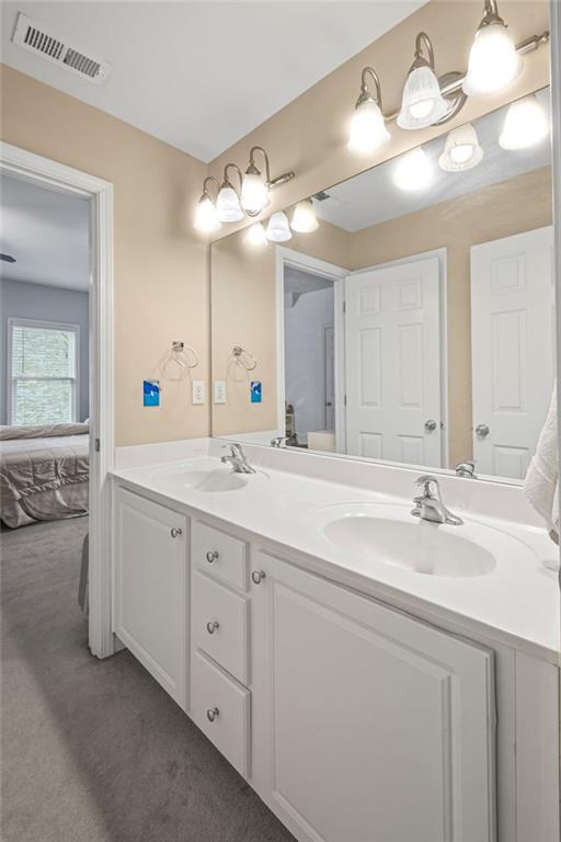 4842 Registry Dr NW, Kennesaw, GA 30152 - ensuite bathroom featuring double vanity