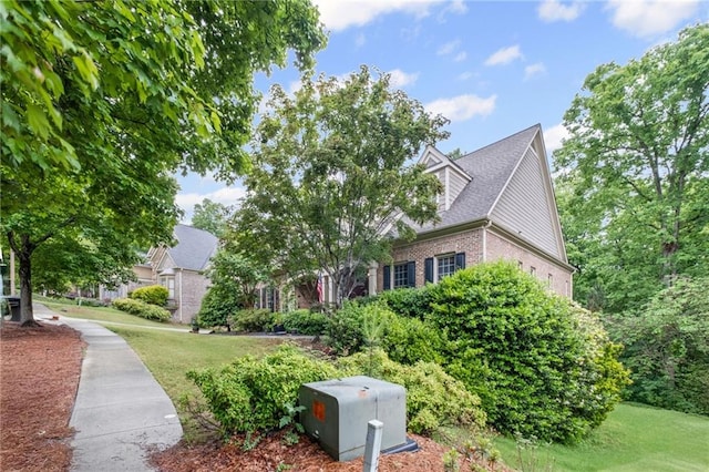 4842 Registry Dr NW, Kennesaw, GA 30152 - view of side of property with brick siding and a yard
