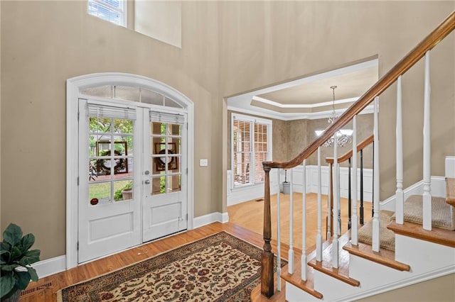 4842 Registry Dr NW, Kennesaw, GA 30152 - foyer with wood finished floors, stairs, plenty of natural light, and french doors