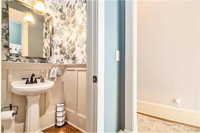 8901 Watkins Mill Rd, Winston, GA 30187 - bathroom featuring a wainscoted wall and wood finished floors