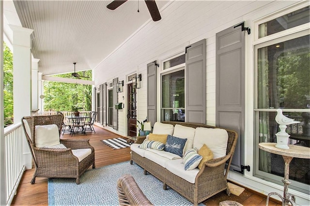 8901 Watkins Mill Rd, Winston, GA 30187 - covered porch with ceiling fan and an outdoor hangout area