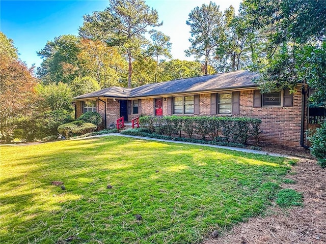 single story home featuring a front yard