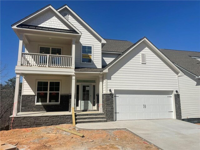 craftsman-style home with a front yard