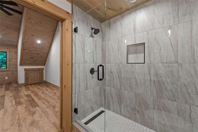 74 Cohutta Overlook Way, Blue Ridge, GA 30513 - bathroom with a shower stall, wood finished floors, lofted ceiling, wood ceiling, and a ceiling fan