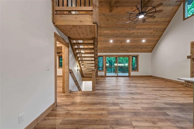 74 Cohutta Overlook Way, Blue Ridge, GA 30513 - unfurnished living room with baseboards, ceiling fan, wood finished floors, wood ceiling, and high vaulted ceiling