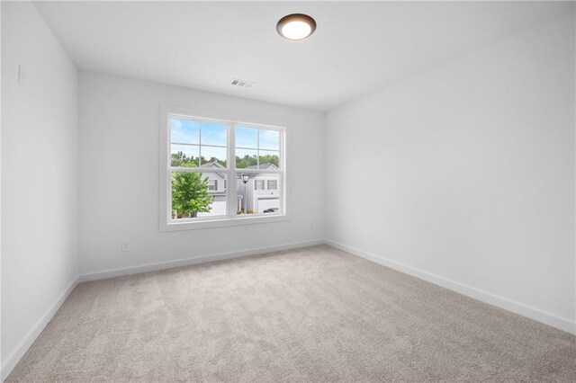 150 Chandler Trce, Covington, GA 30016 - empty room with carpet flooring and baseboards