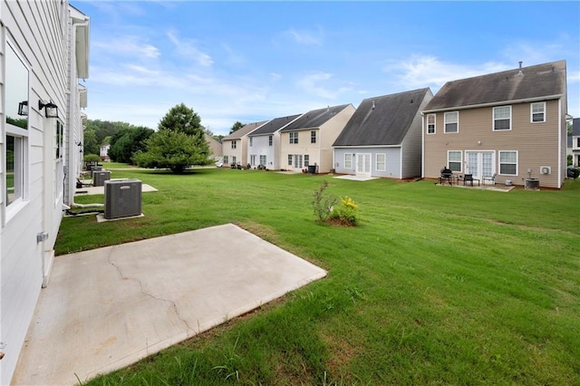 150 Chandler Trce, Covington, GA 30016 - view of grassy yard with a patio area and a residential view