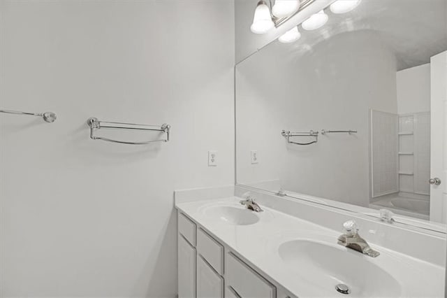 bathroom with double vanity and a sink