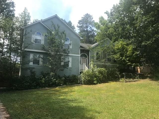 1050 Queensbury Run, Acworth, GA 30102 - view of side of property with a lawn