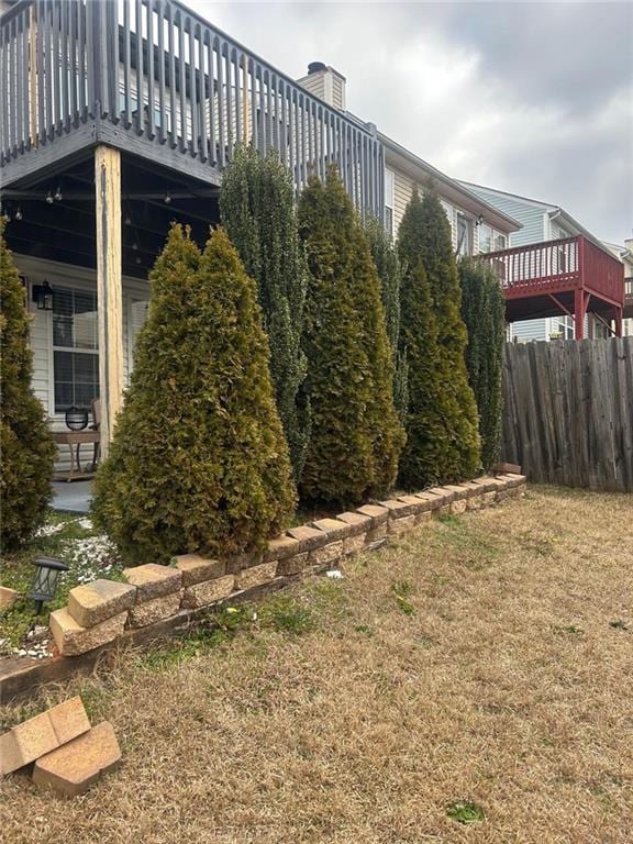 view of yard with a wooden deck