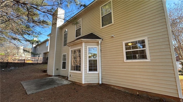 back of house with a patio area