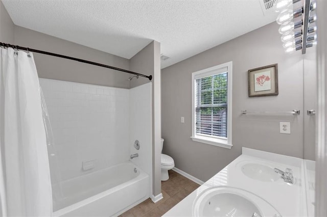 full bathroom featuring toilet, shower / bath combination with curtain, a sink, and tile patterned flooring