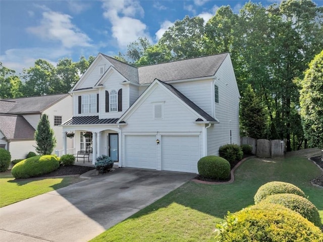 traditional-style home featuring fence, a garage, a porch, a front yard, and concrete driveway