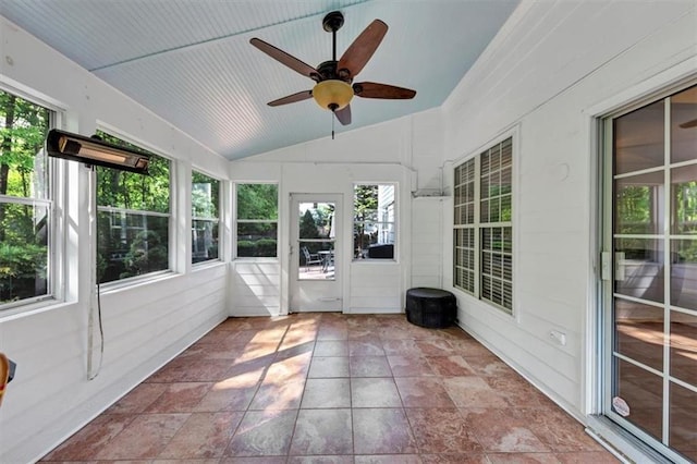 unfurnished sunroom with ceiling fan