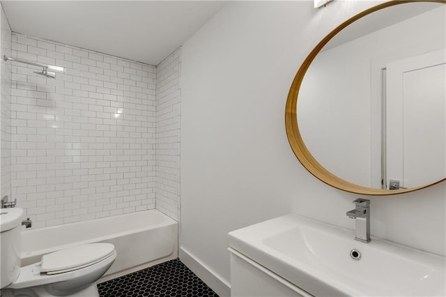 full bath featuring toilet, tile patterned floors, baseboards, shower / bath combination, and vanity