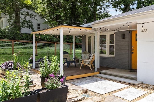 deck featuring fence
