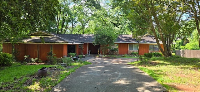 1717 Briarbend Ct, Stone Mountain, GA 30088 - ranch-style home featuring asphalt driveway