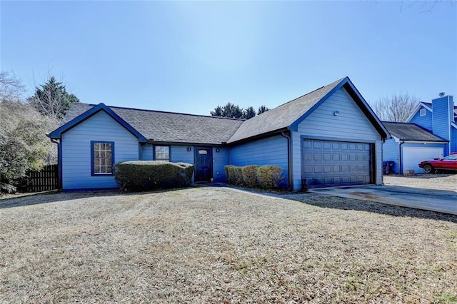 ranch-style home with a garage