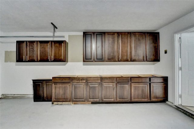 bar with dark brown cabinets