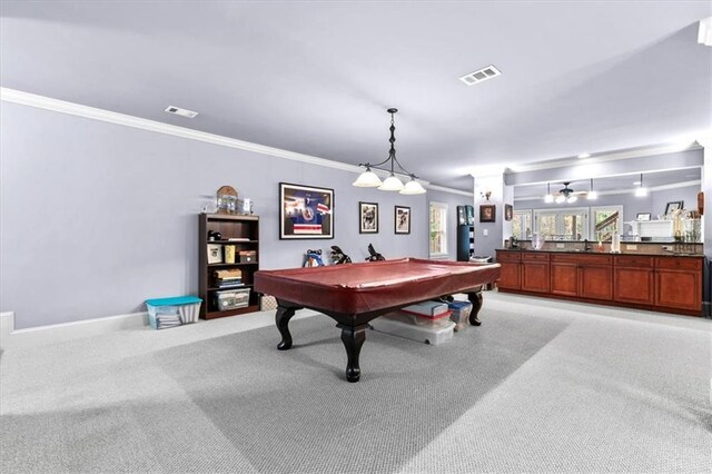 playroom featuring light carpet, ornamental molding, and billiards