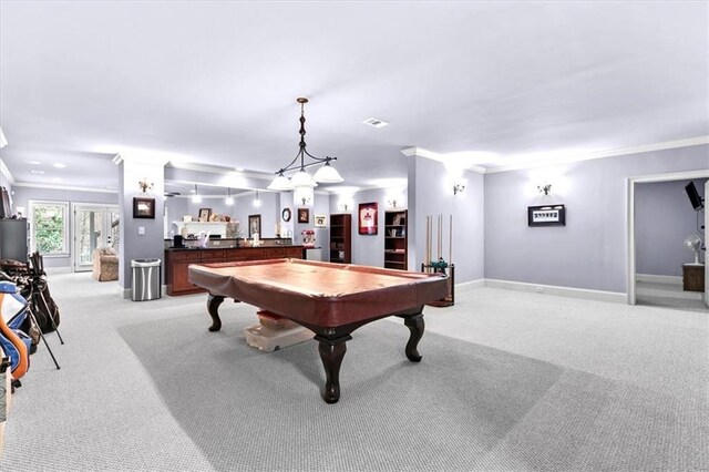 playroom with light carpet, crown molding, and billiards