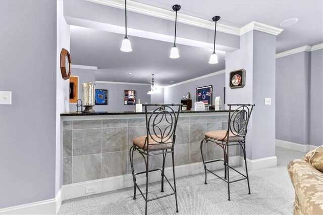 bar featuring carpet flooring, decorative light fixtures, and ornamental molding