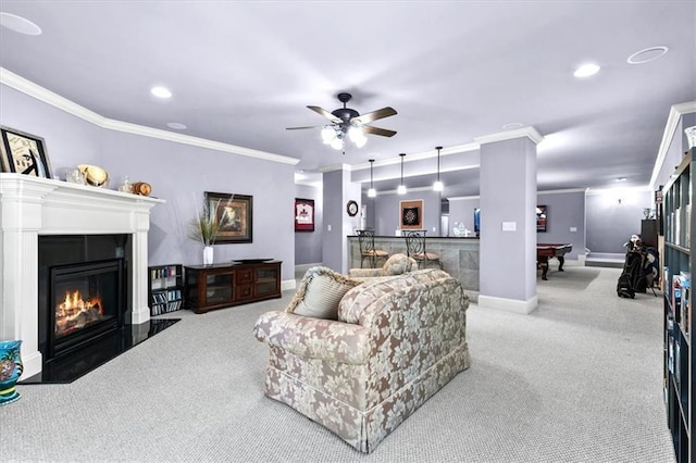 carpeted living room featuring crown molding, ceiling fan, and pool table