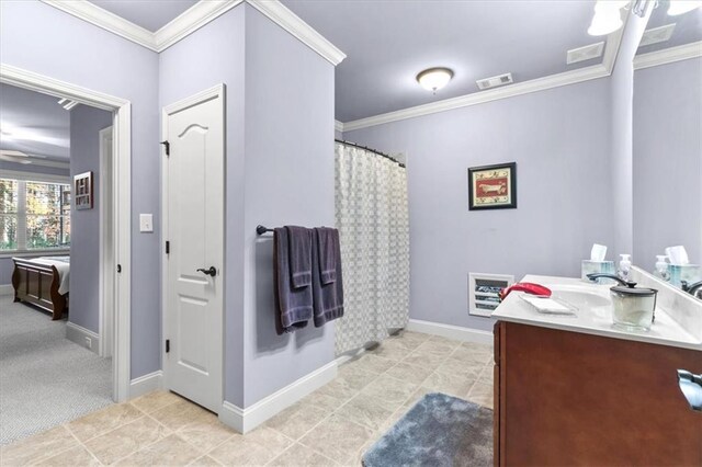 bathroom with tile patterned floors, crown molding, vanity, and a shower with shower curtain